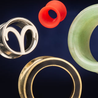 tunnels for stretched ears in steel, silicone, stone, and brass